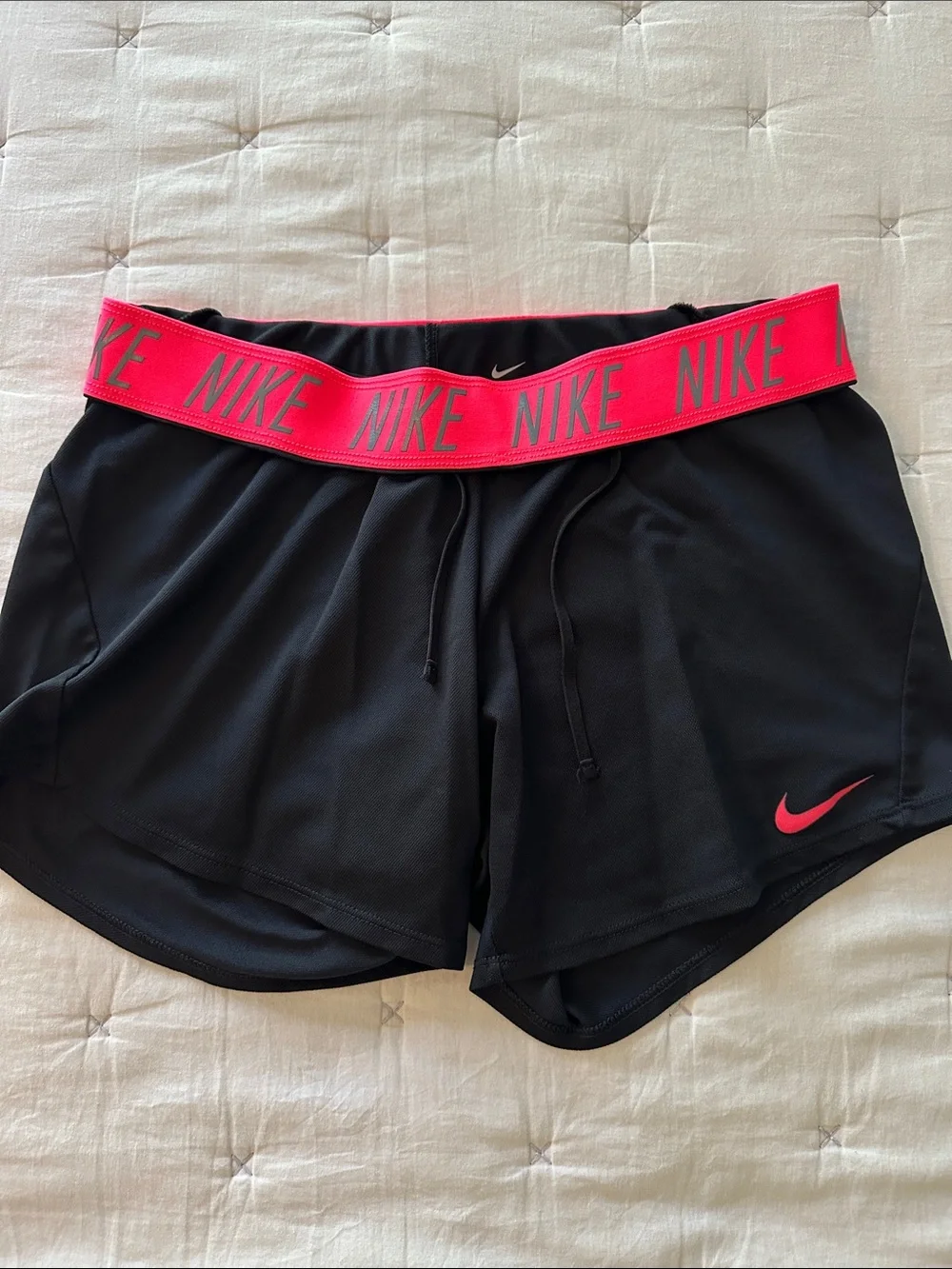 Nike Black Women's Athletic Shorts with Pink Trim